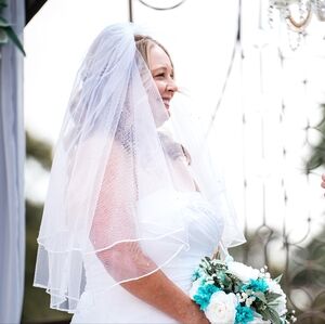layered white wedding veil and comb